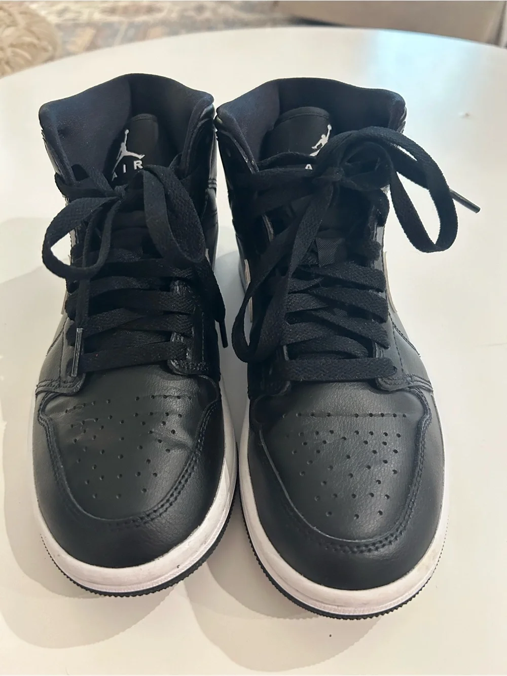 Nike Black and White Mid-Top Sneakers